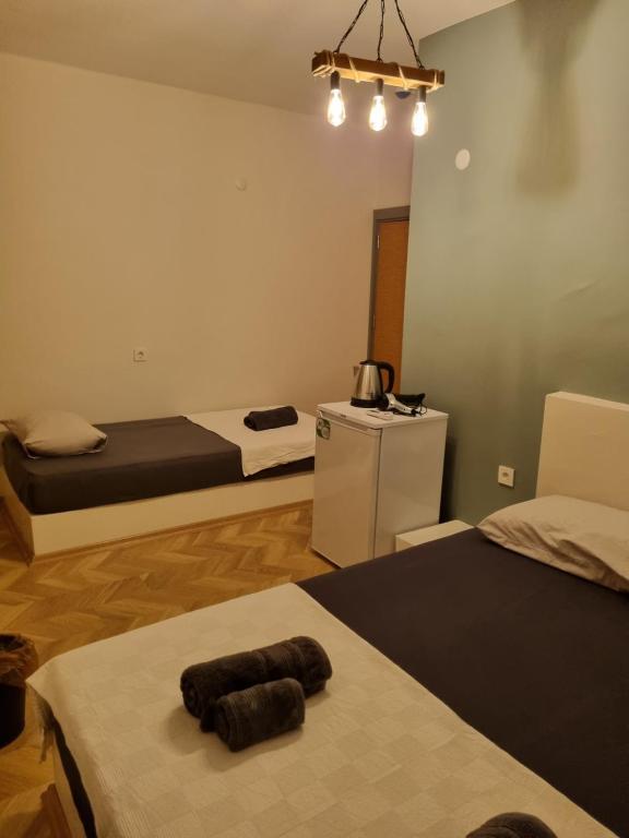 A bed or beds in a room at El Mundo Suites