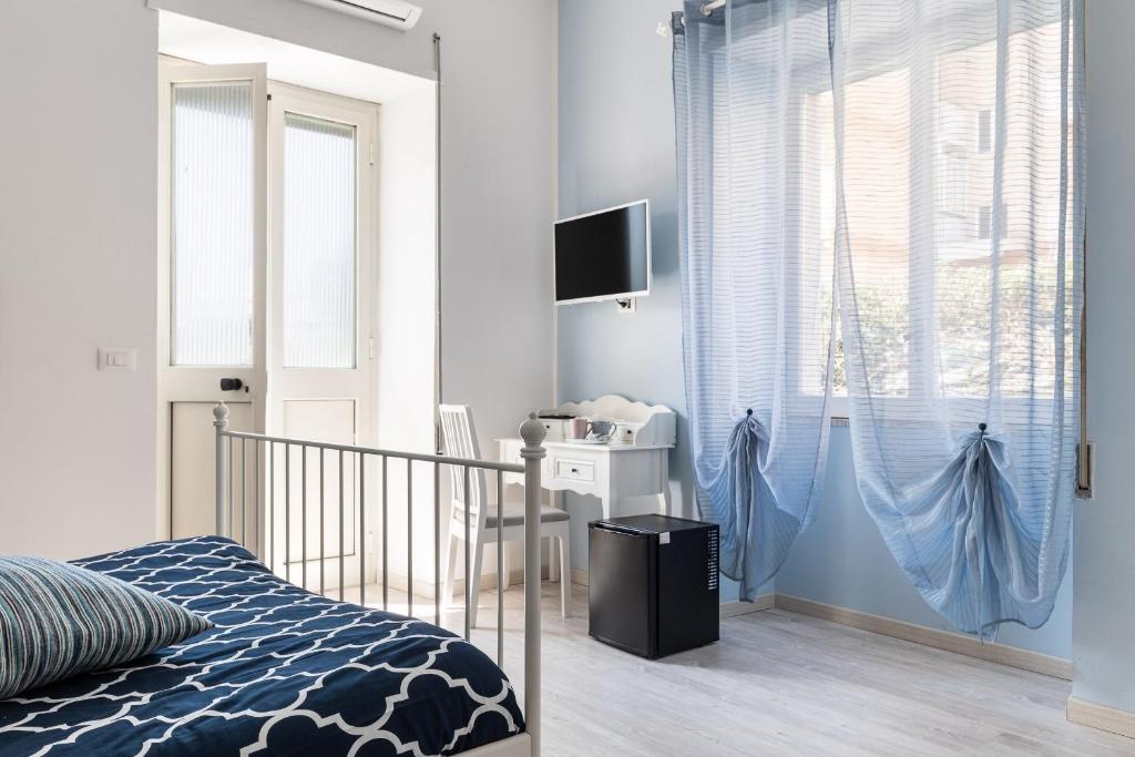 Ένα ή περισσότερα κρεβάτια σε δωμάτιο στο B&B Sapore di Mare Serapo