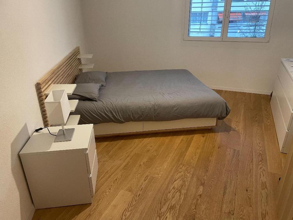 Postel nebo postele na pokoji v ubytování Chambre double Montreux