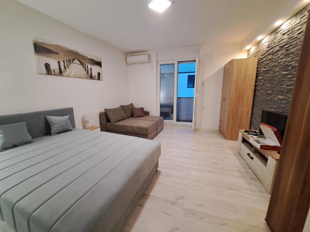 Ένα ή περισσότερα κρεβάτια σε δωμάτιο στο Apartment BeoSun