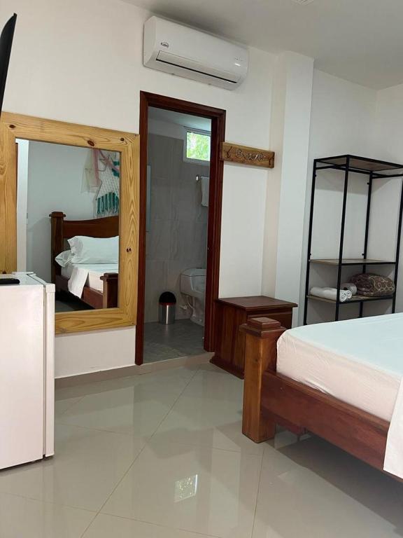 Postel nebo postele na pokoji v ubytování Eco hotel el bosque