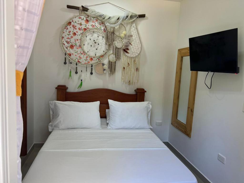 Postel nebo postele na pokoji v ubytování Eco hotel el bosque