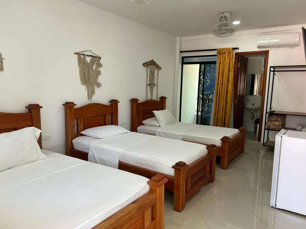Postel nebo postele na pokoji v ubytování Eco hotel el bosque