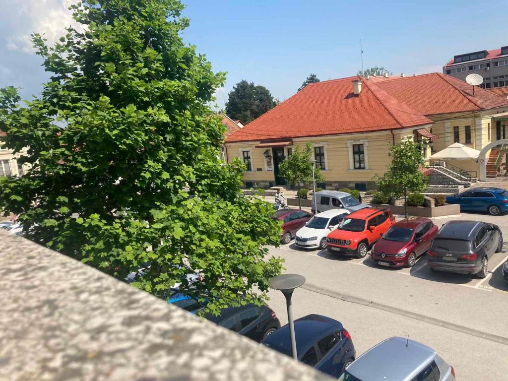 a group of cars parked in a parking lot at BAJKA in Čačak