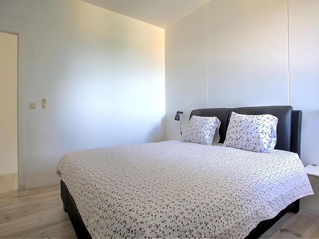 Postel nebo postele na pokoji v ubytování Comfortable vacation home in Gourdon