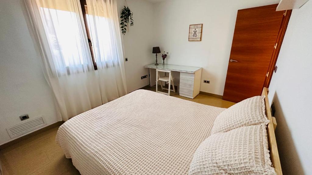 Posteľ alebo postele v izbe v ubytovaní Hermosa Villa L'Ardiaca