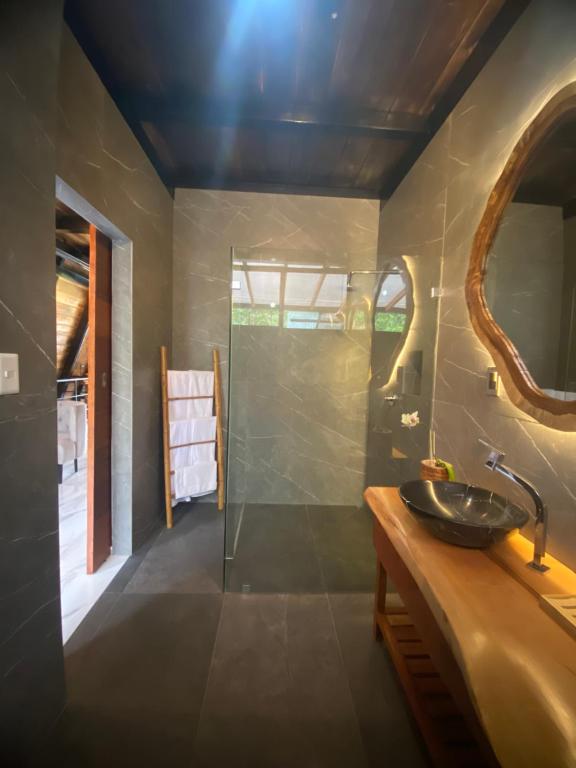 Koupelna v ubytování Suites Casa ColibrÍ