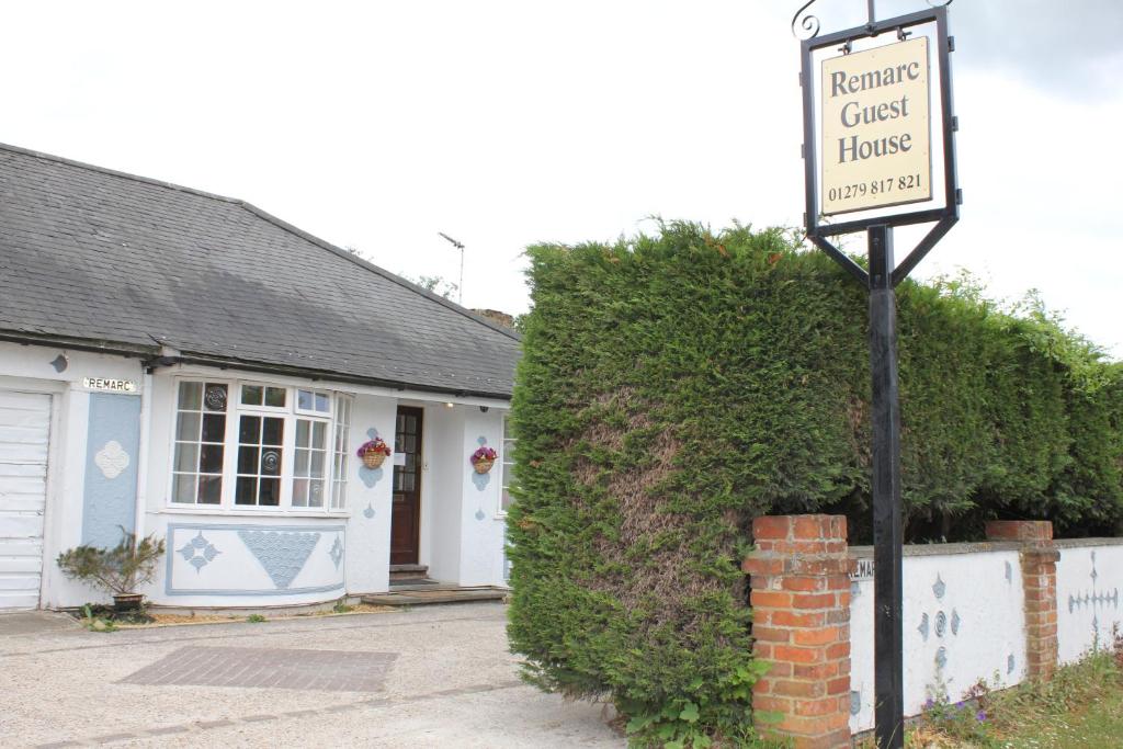 a street sign in front of a guest house at Remarc Guest House in Takeley