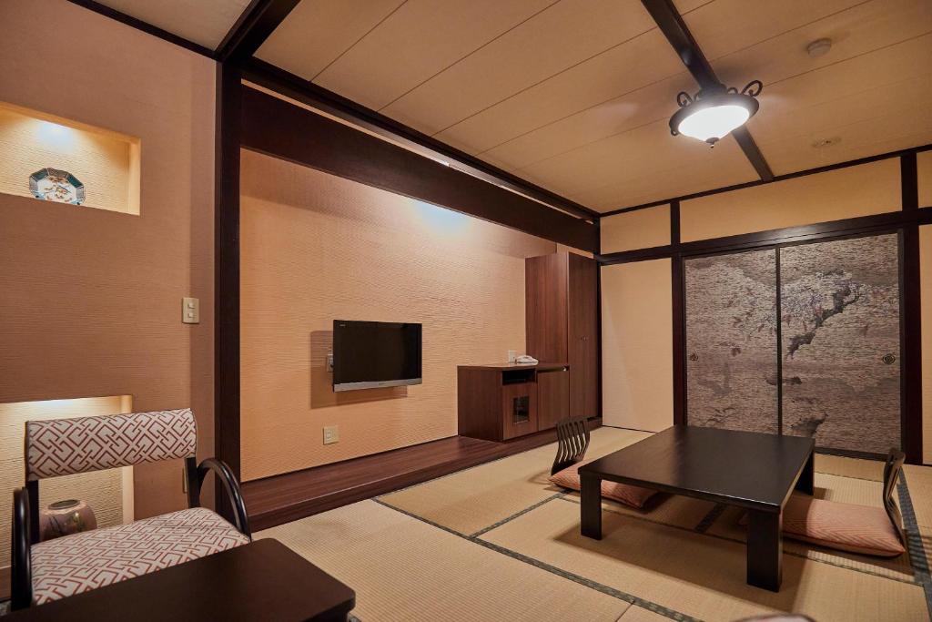 Kamisuwa Onsen Shinyu - Экономика Тройная Комната