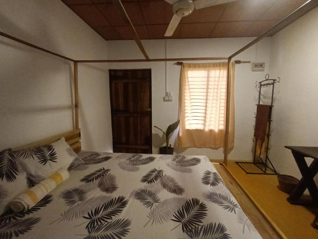 Postel nebo postele na pokoji v ubytování Starfish Cabbana