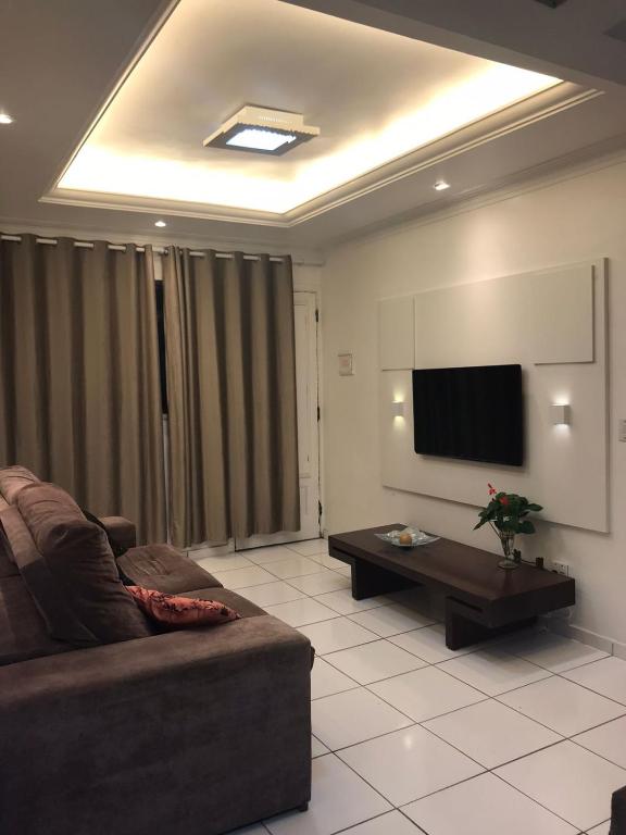 Et tv og/eller underholdning på Conforto aproveitando Santos!