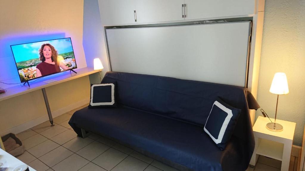 Televízia a/alebo spoločenská miestnosť v ubytovaní Résidence Les Embruns - maeva Home - Studio 4 personnes - Confort MAE-0126