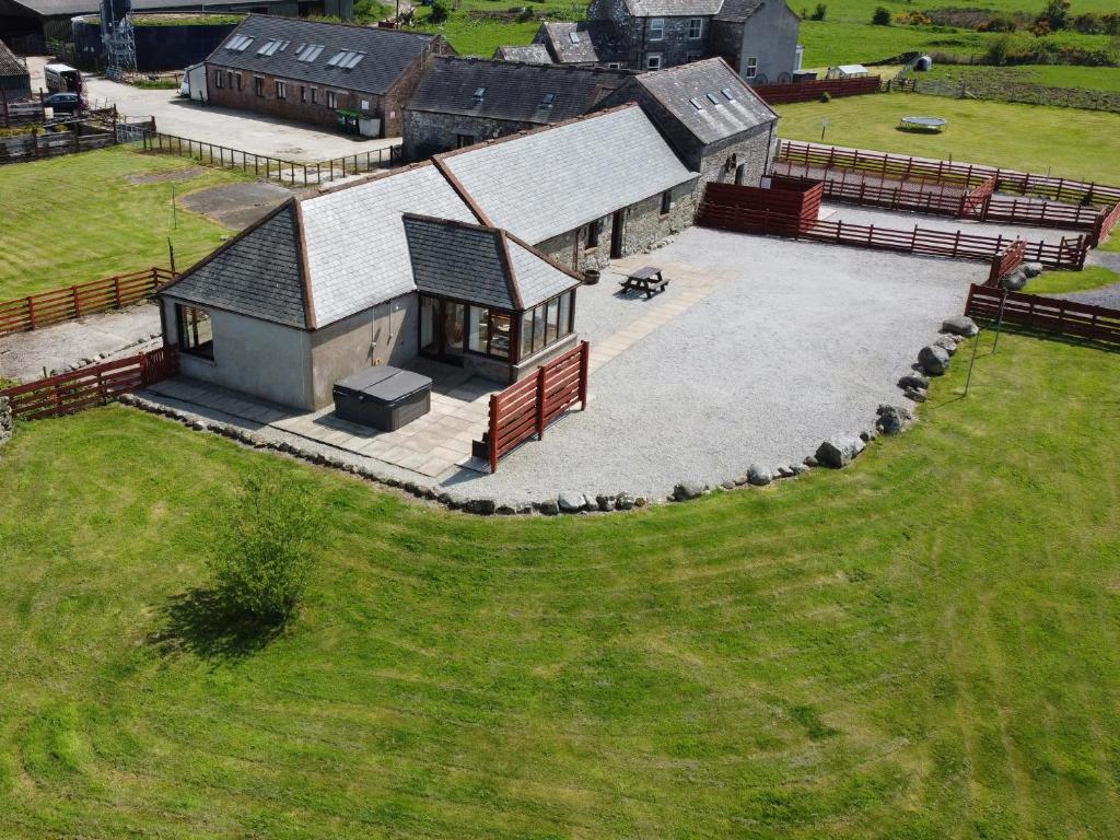 an aerial view of a house with a large yard at The Middle Byre in Girthon