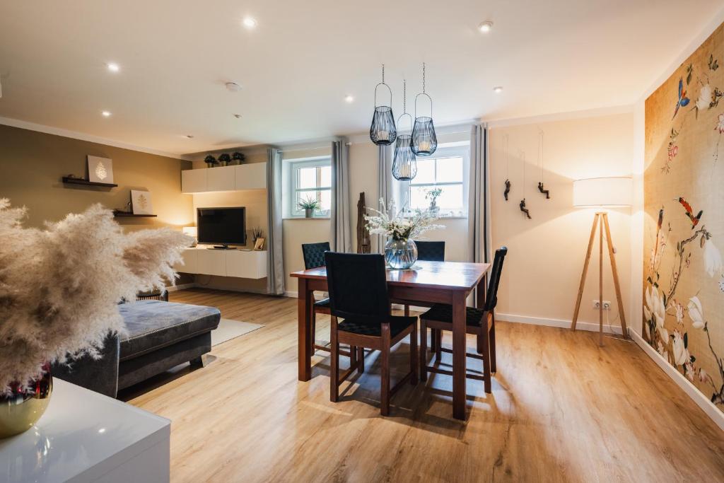 TV a/nebo společenská místnost v ubytování Ferienwohnung "UtTied" - Ankommen und Entspannen