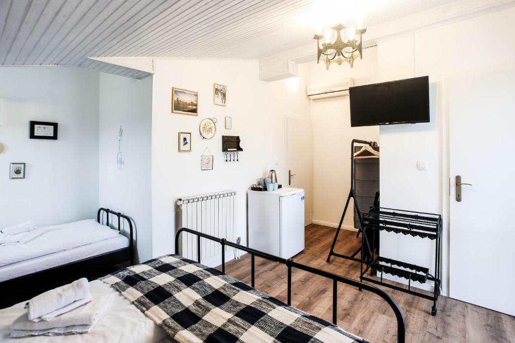 Postel nebo postele na pokoji v ubytování Sherlock's Holidays boutique rooms