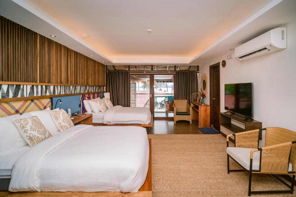 Postel nebo postele na pokoji v ubytování Banig Beach Resort El Nido
