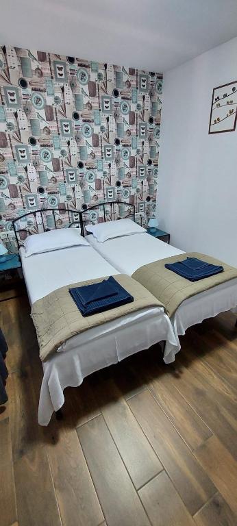 Postel nebo postele na pokoji v ubytování Casa IBIS