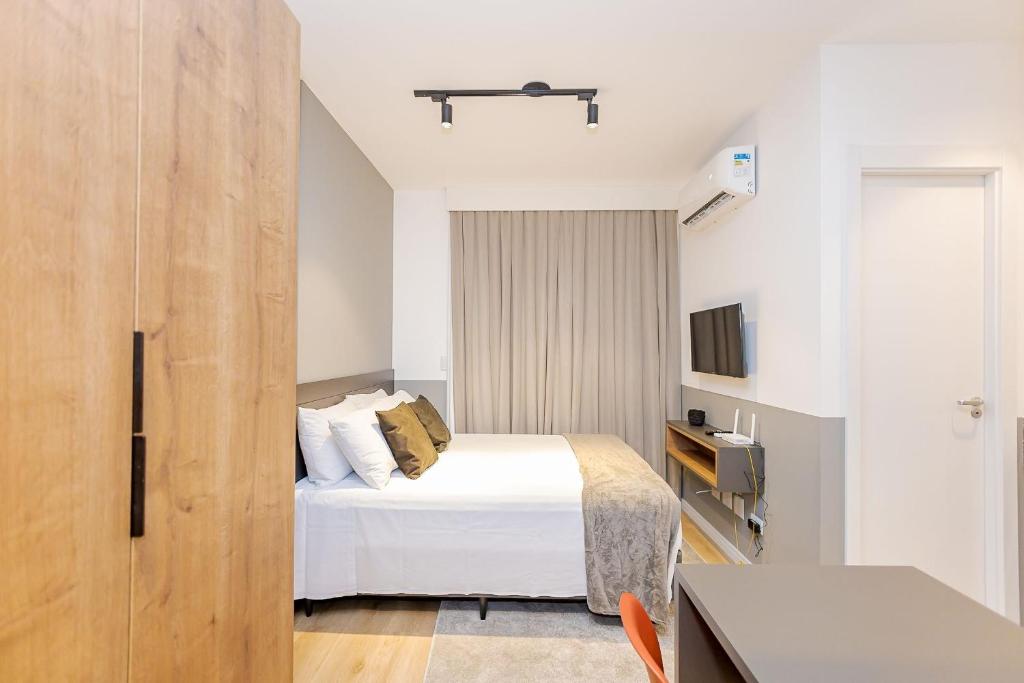 Un pat sau paturi într-o cameră la Housi Eco Smart - ECO0407