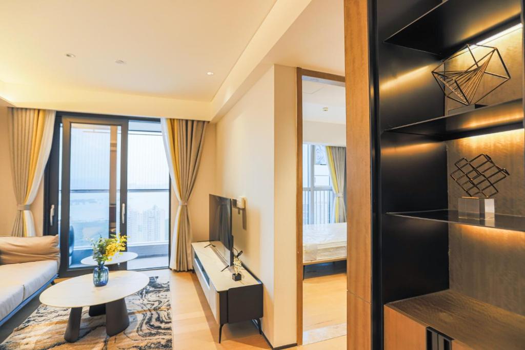 TV a/nebo společenská místnost v ubytování Canopy Executive Apartments - Shenzhen Futian Center