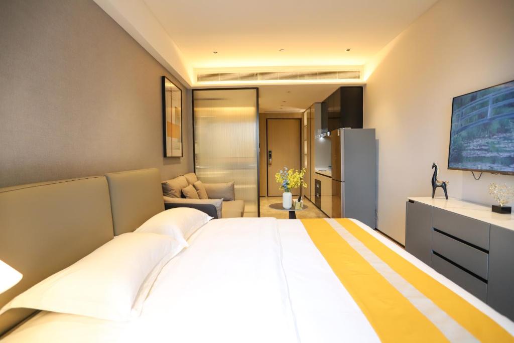 TV a/nebo společenská místnost v ubytování Canopy Executive Apartments - Shenzhen Futian Center