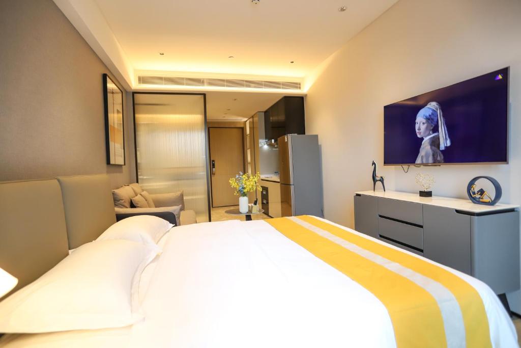 TV a/nebo společenská místnost v ubytování Canopy Executive Apartments - Shenzhen Futian Center
