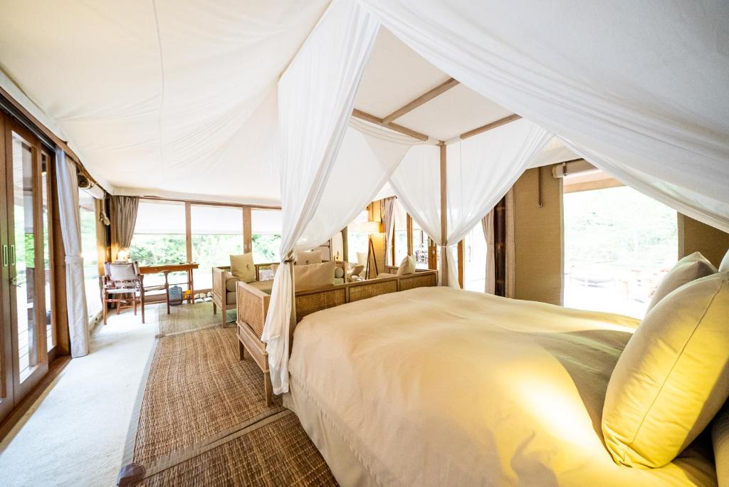Postel nebo postele na pokoji v ubytování KEIKOKU GLAMPING TENT