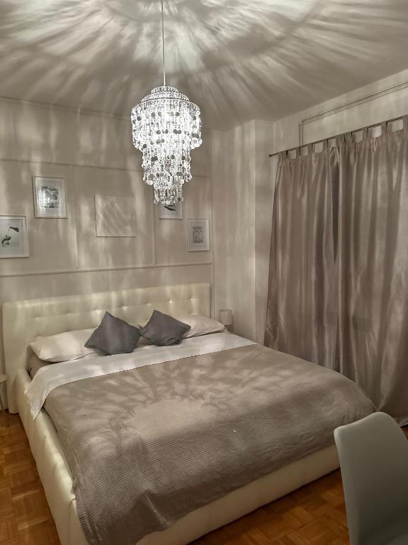 Posteľ alebo postele v izbe v ubytovaní Casa Tosić