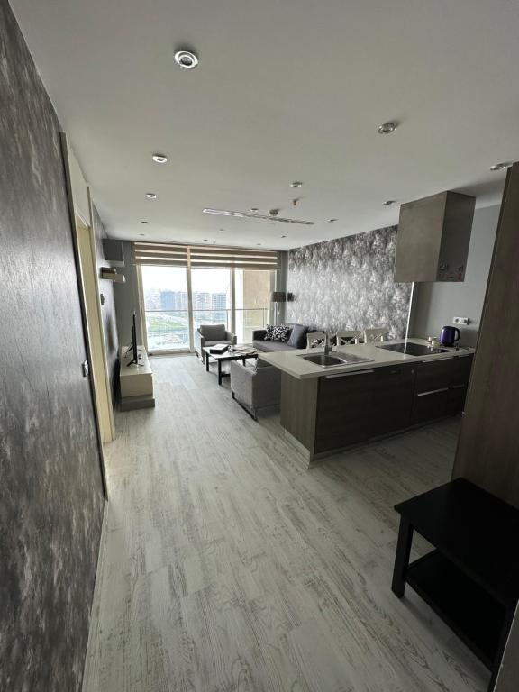 A kitchen or kitchenette at Ottomare Suites luxury apartment with pool with amazing view