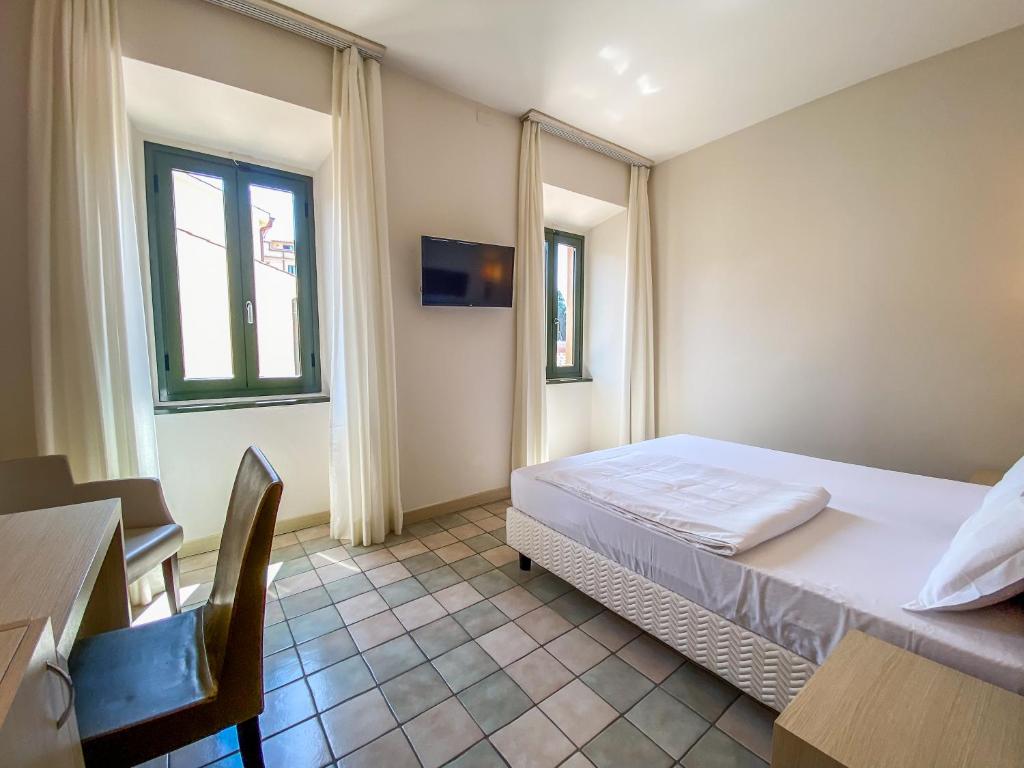 Postel nebo postele na pokoji v ubytování La Mandola eco Hostel