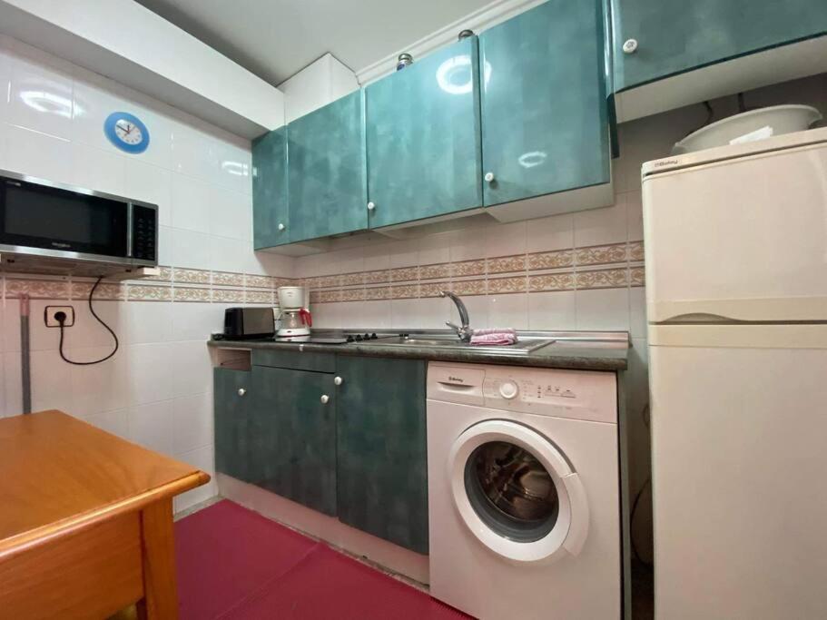 Kuchyňa alebo kuchynka v ubytovaní appartement plage des naufragés