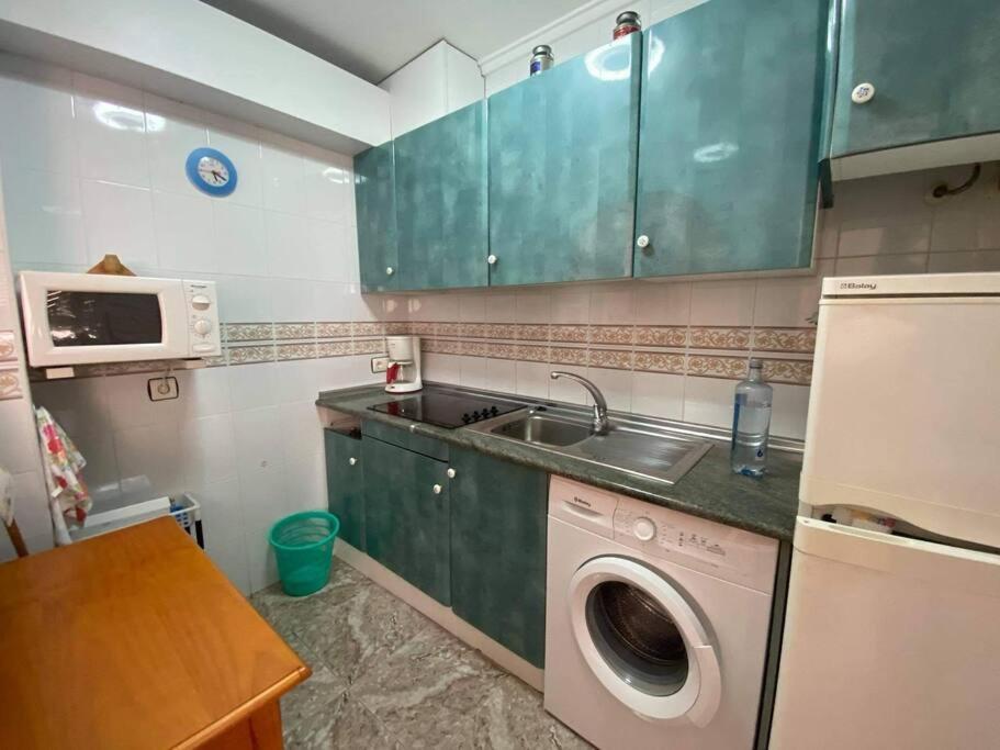 Kuchyňa alebo kuchynka v ubytovaní appartement plage des naufragés