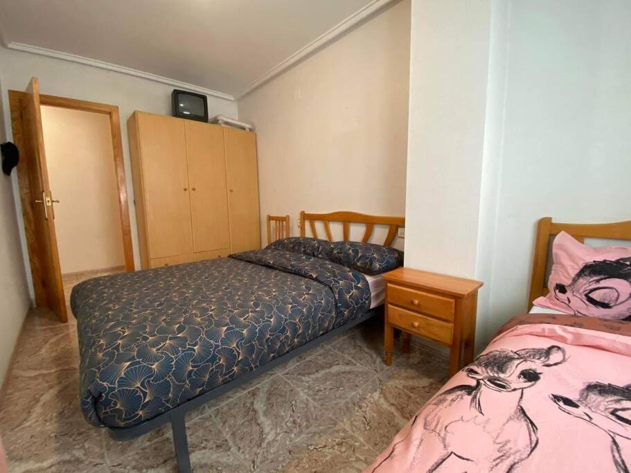 Posteľ alebo postele v izbe v ubytovaní appartement plage des naufragés