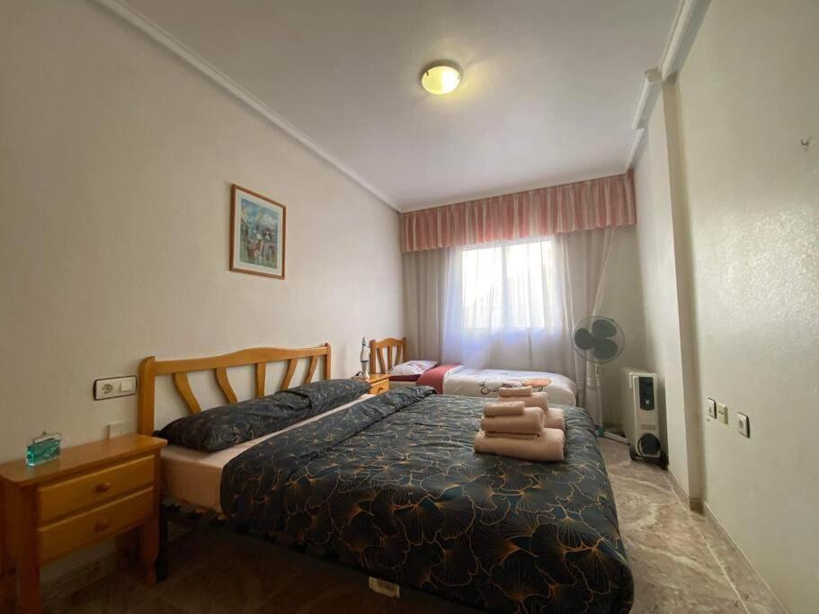 Posteľ alebo postele v izbe v ubytovaní appartement plage des naufragés