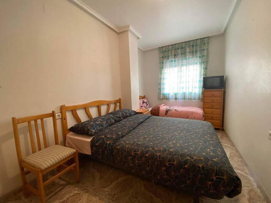Posteľ alebo postele v izbe v ubytovaní appartement plage des naufragés