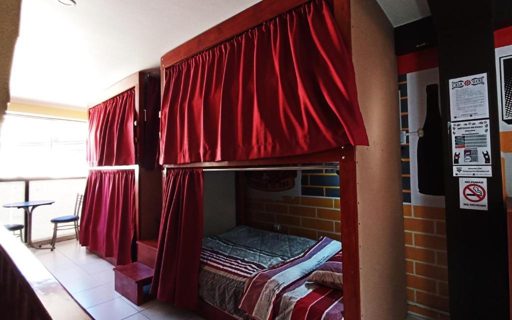 Postel nebo postele na pokoji v ubytování Casa Sucre Hostel Ayacucho