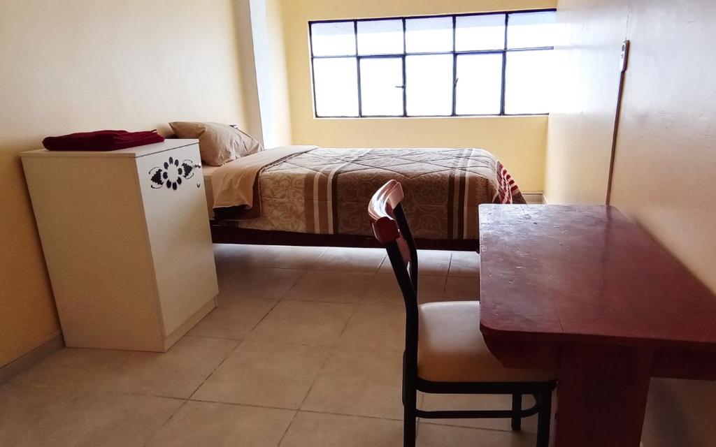 Postel nebo postele na pokoji v ubytování Casa Sucre Hostel Ayacucho