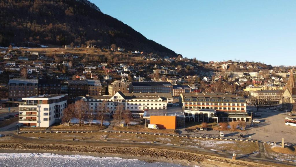 an aerial view of a city with a mountain at Park Hotel Vossevangen in Vossevangen