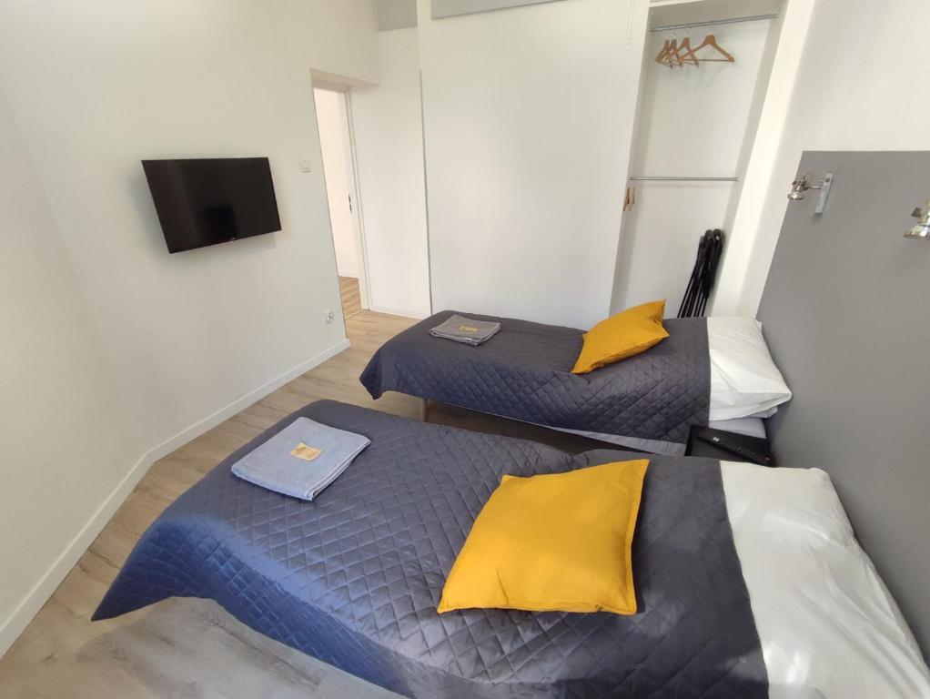 Posteľ alebo postele v izbe v ubytovaní Apartament Rybaki 22