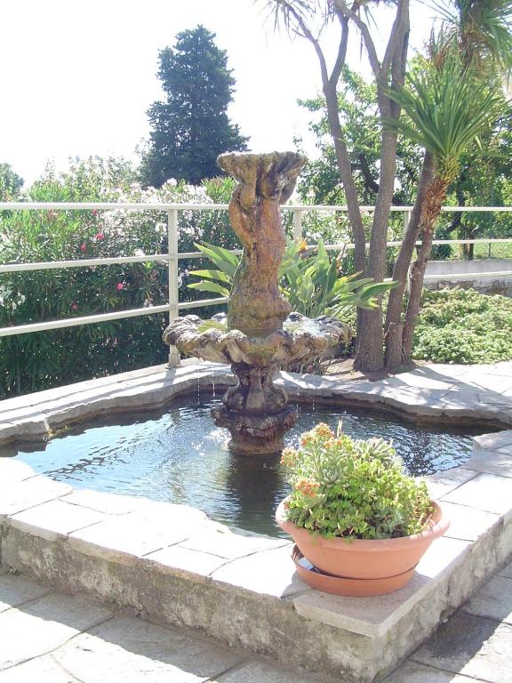 Vonkajšia záhrada v ubytovaní Residence Hotel Edy