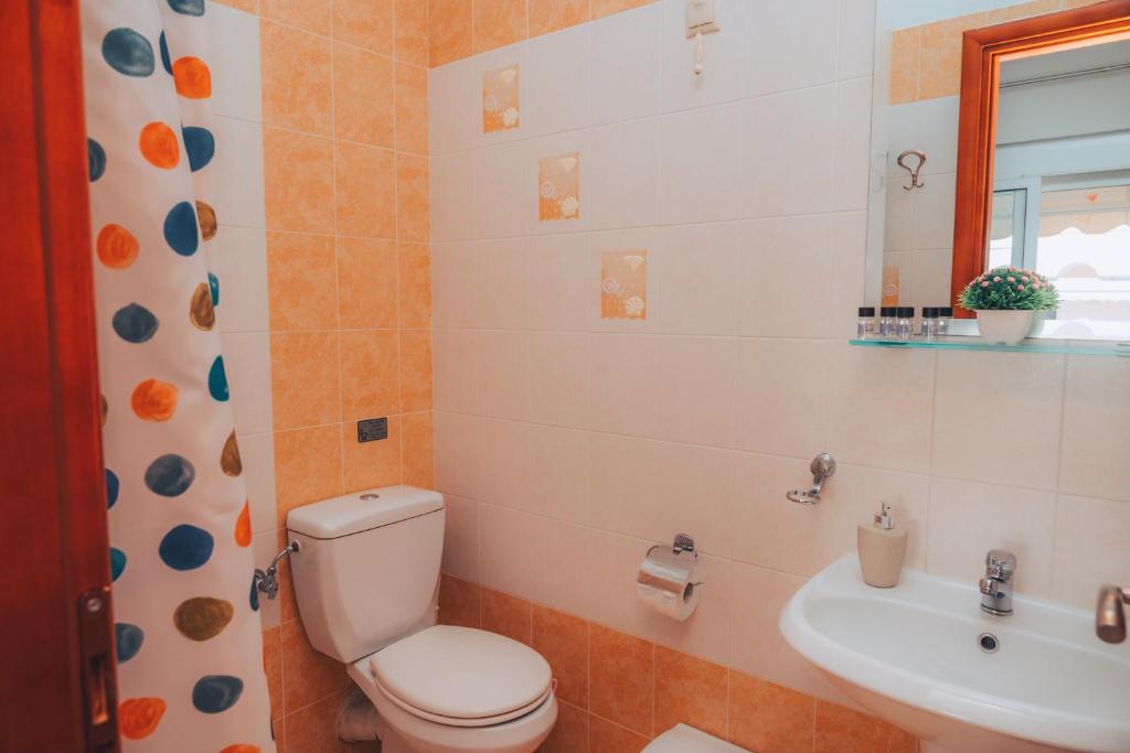 Koupelna v ubytování Dionysos Rooms