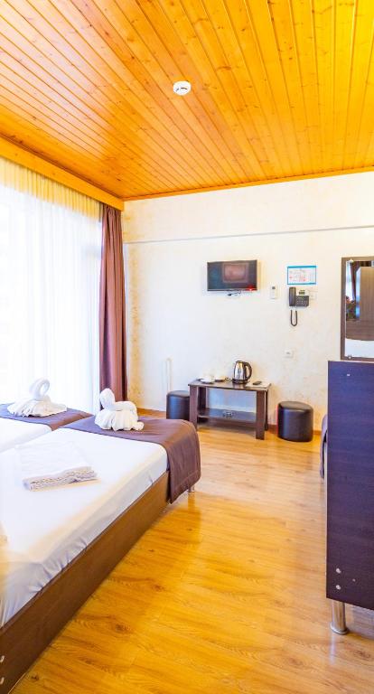 Postel nebo postele na pokoji v ubytování Beach House