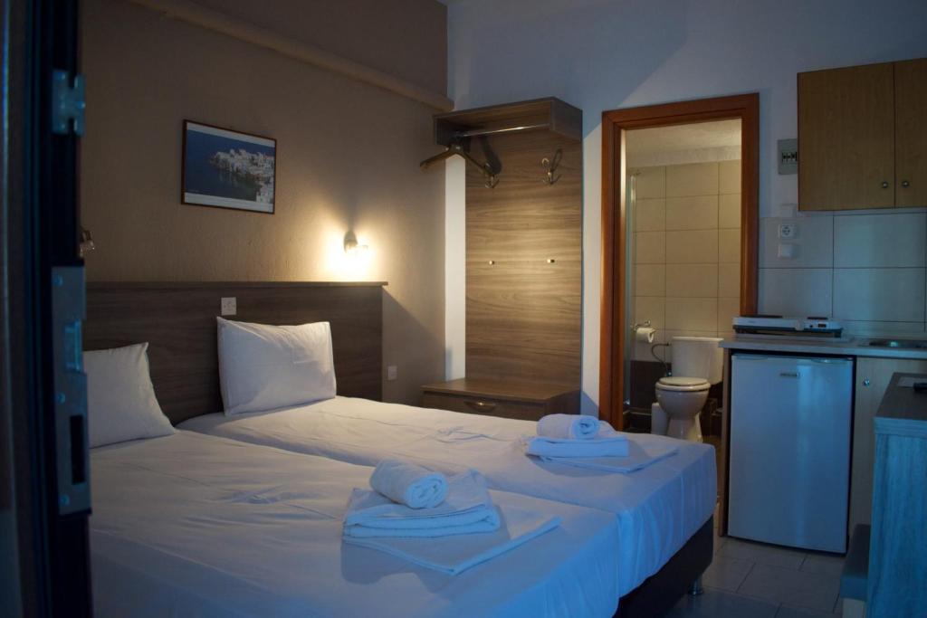 A bed or beds in a room at Studios Vaso