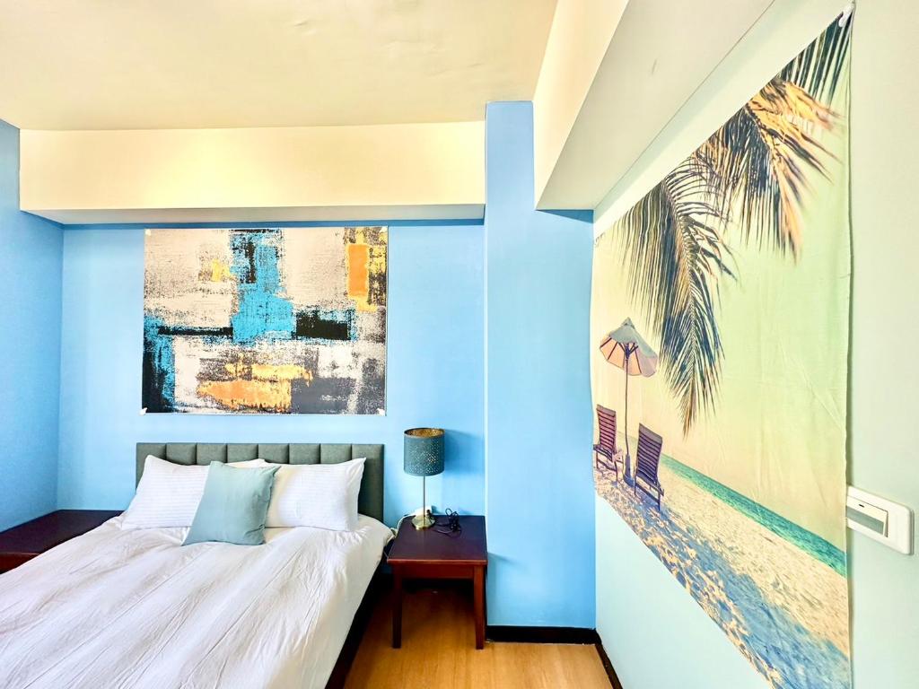 Postel nebo postele na pokoji v ubytování 莫蘭狄