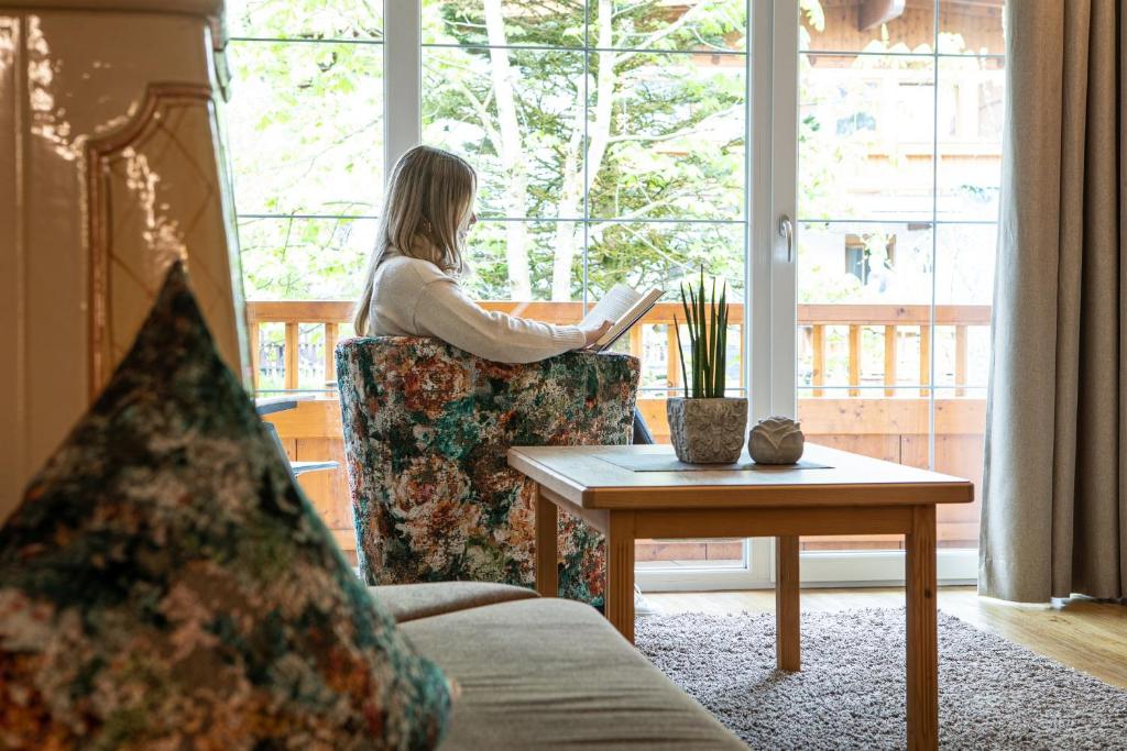 Posezení v ubytování Alphaus Aparthotel