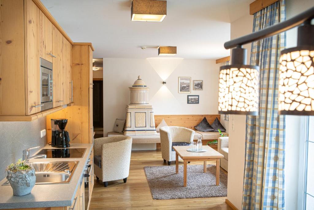Posezení v ubytování Alphaus Aparthotel