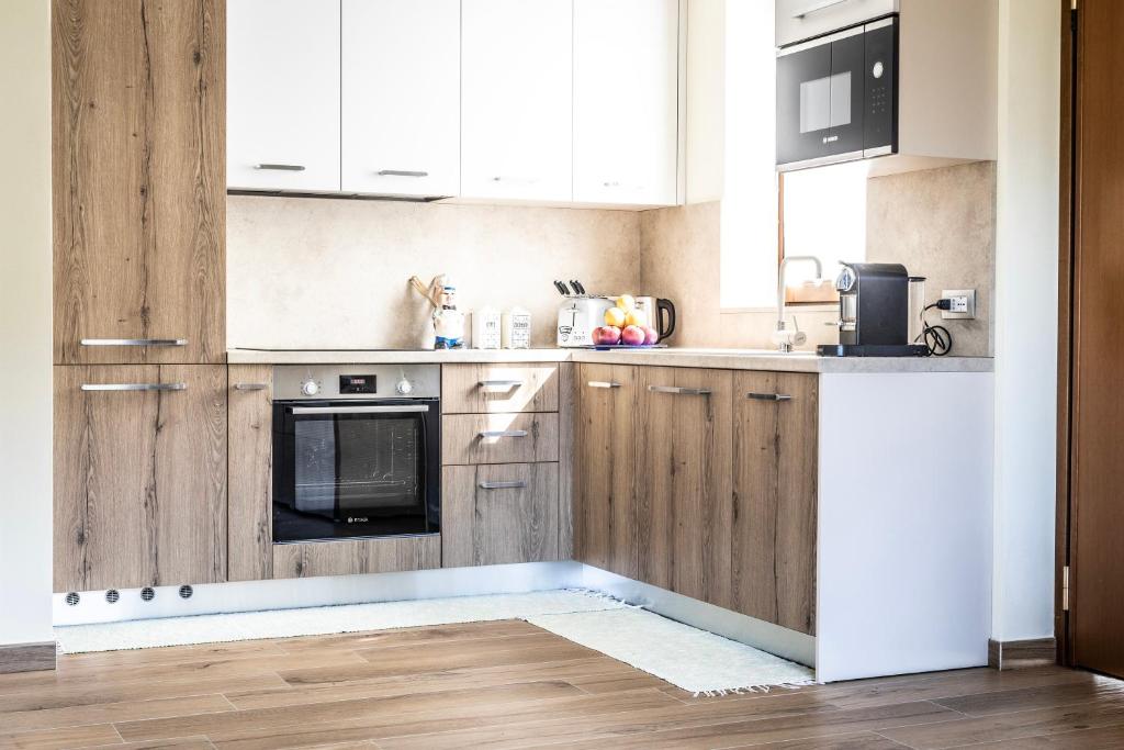Kuchyň nebo kuchyňský kout v ubytování La Casa sul Fiume
