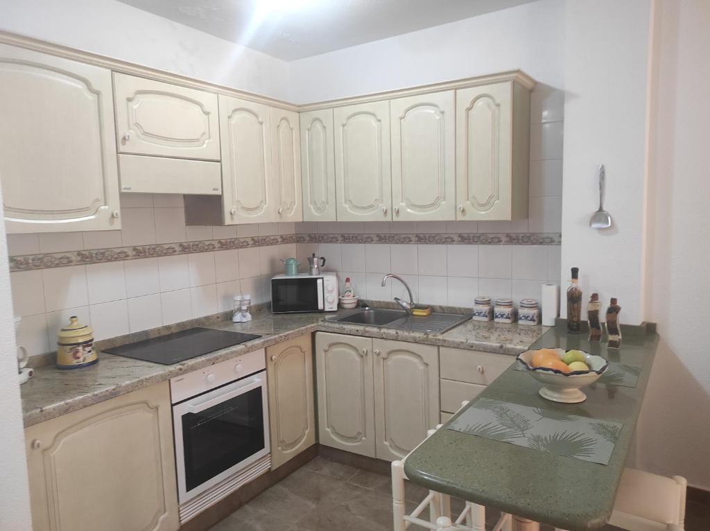 Kuchyňa alebo kuchynka v ubytovaní Marina Palace Paraiso