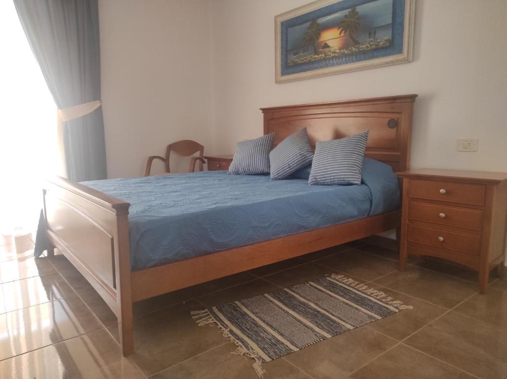 Posteľ alebo postele v izbe v ubytovaní Marina Palace Paraiso