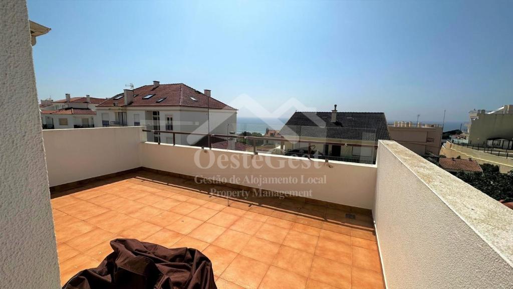 a view from the balcony of a apartment at Varandas da Areia Branca in Praia da Areia Branca