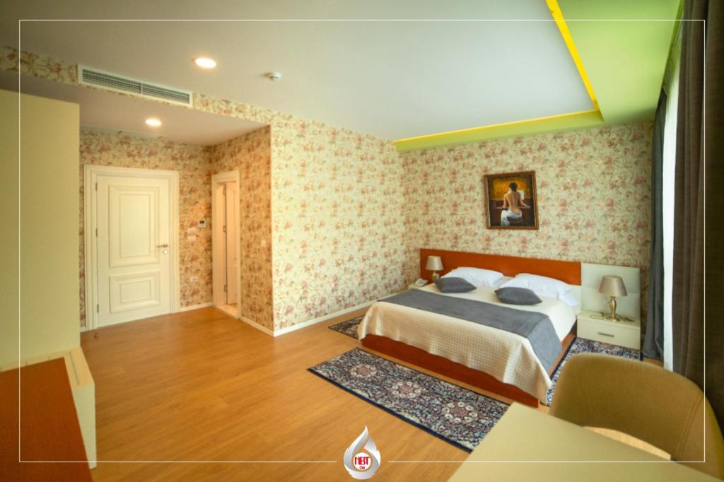 Postel nebo postele na pokoji v ubytování NBT Hotel Reps